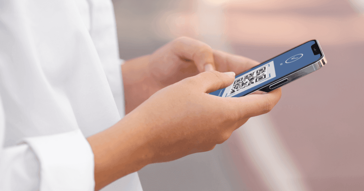 eSIM QR code on a woman's phone screen